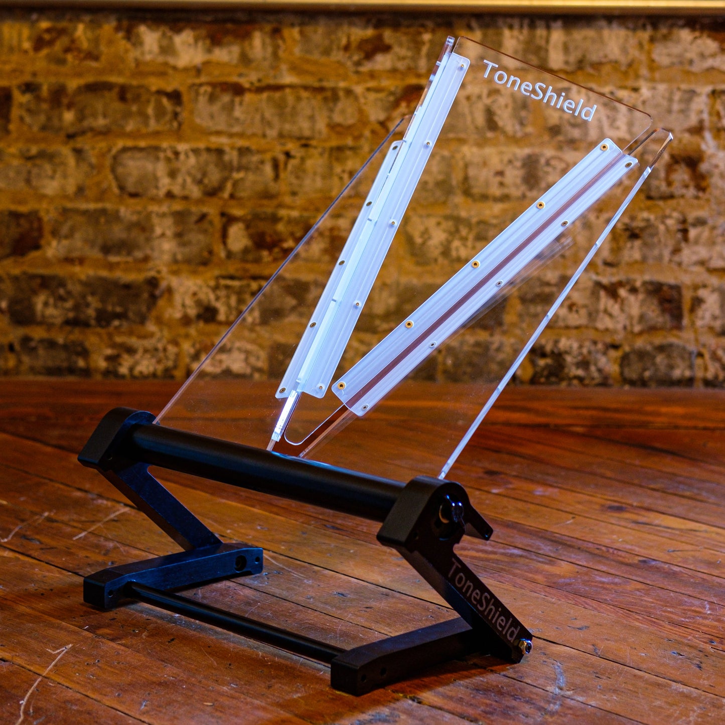 Foldable and adjustable guitar amp shield